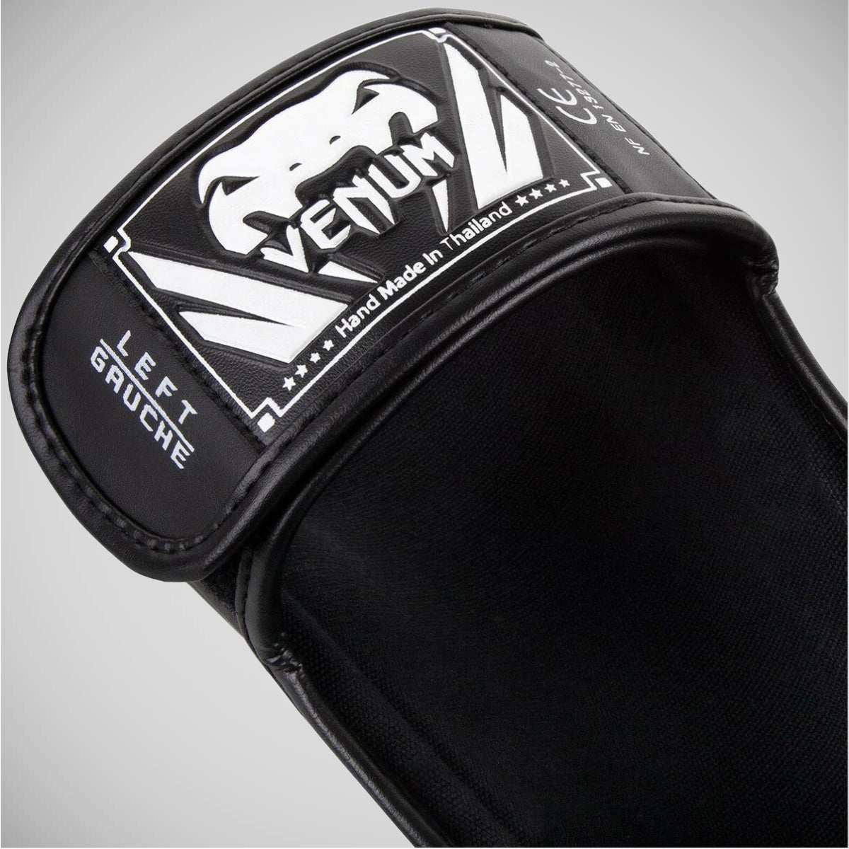 Black/White Venum Elite Shin Guards