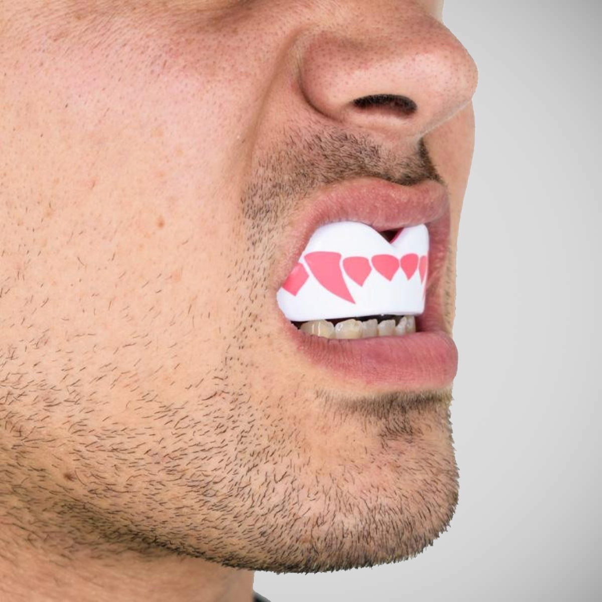 White/Pink SafeJawz Extro Pink Fangz Mouth Guard